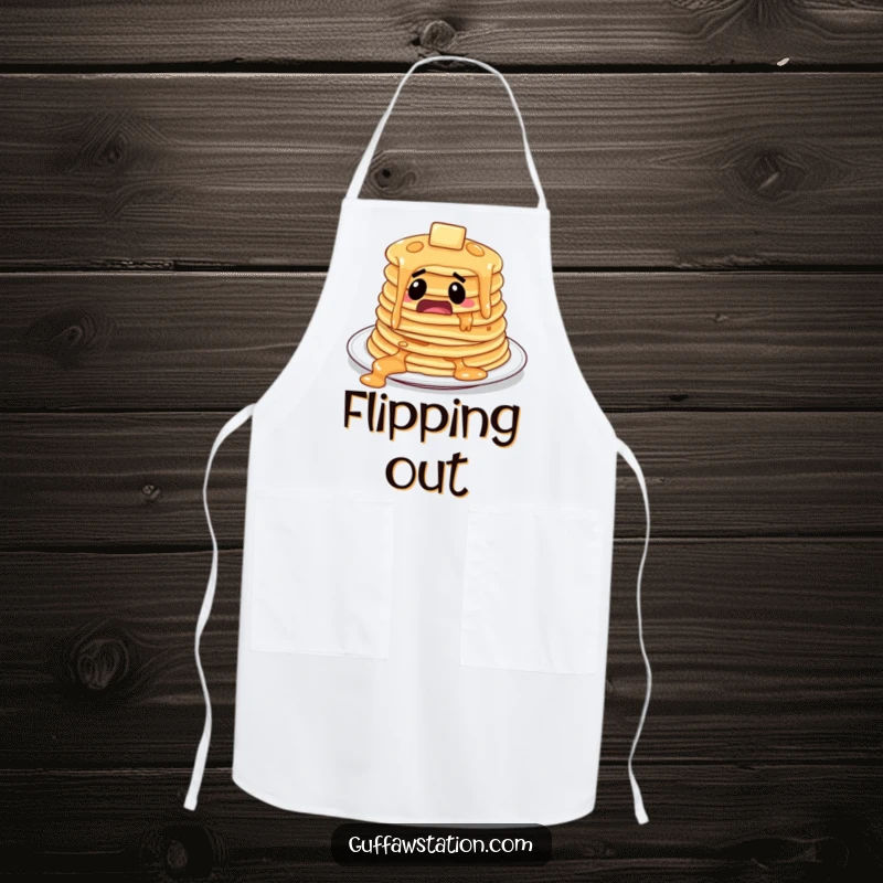 Funny startled pancakes sliding off a plate, on a practical and funny kitchen apron.