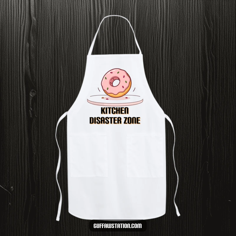 Funny donut depicted rolling off a table in slow motion on a durable apron, perfect for humorous kitchen adventures.