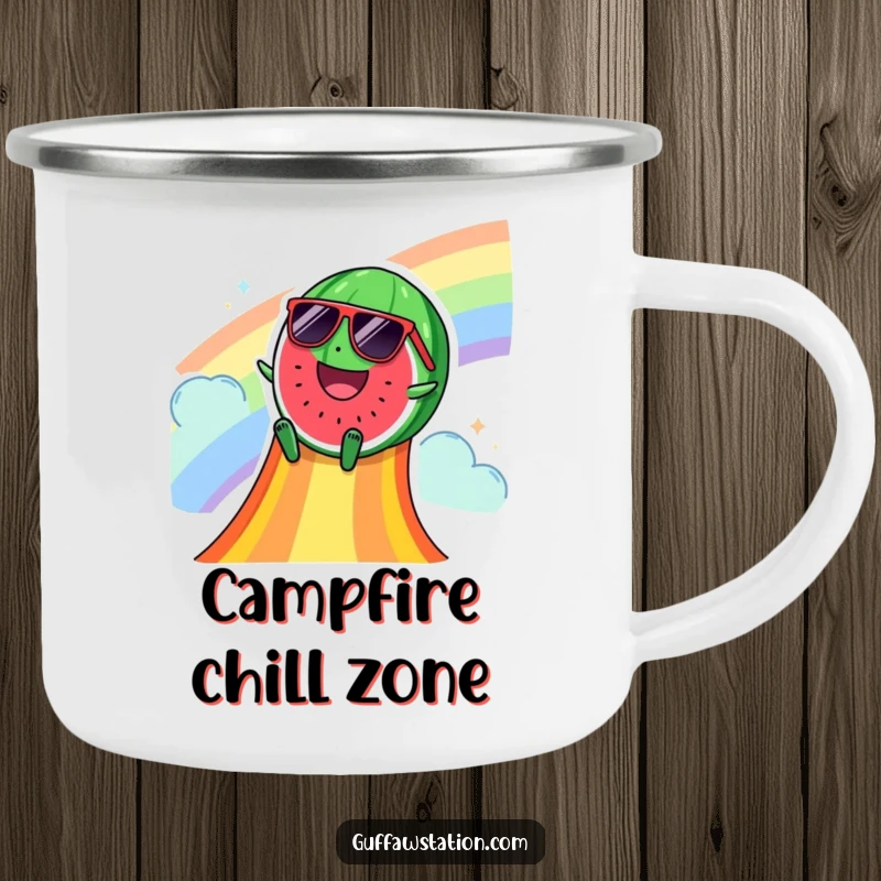 Funny camping mug with a happy watermelon wearing sunglasses, sliding down a rainbow slide, ideal for cool drinks in the wild.