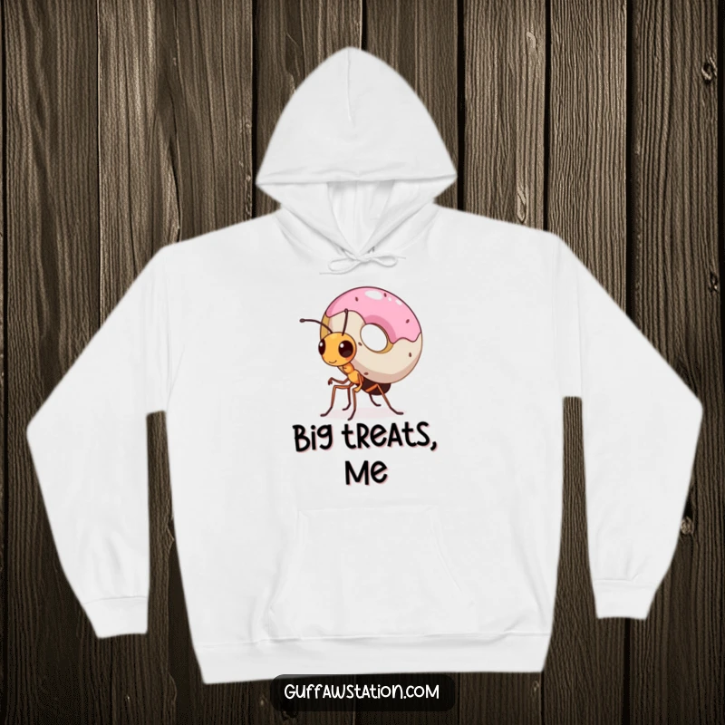 Funny hoodie depicting a small, determined ant making a valiant effort to carry an enormous donut on its back, a comical sight.