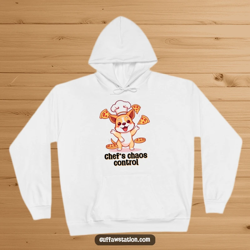 Funny dog in a chef hat attempting to juggle three flying pizzas, printed on a cozy hoodie. A hilarious gift idea.
