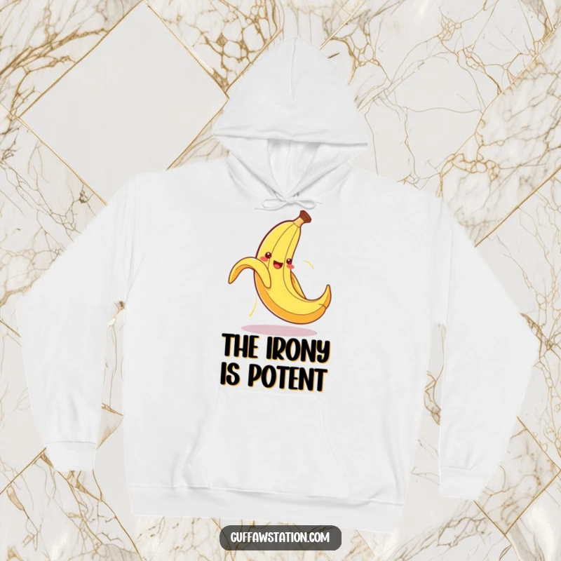Funny hoodie featuring a cute anthropomorphic banana peel hilariously slipping on its own discarded peel, flailing wildly.