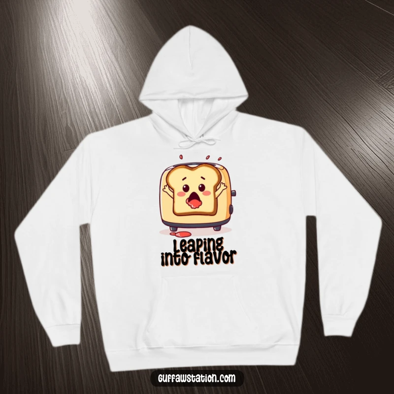 Funny hoodie featuring a surprised slice of toast leaping from a toaster with jam splatter, cozy and humorous.