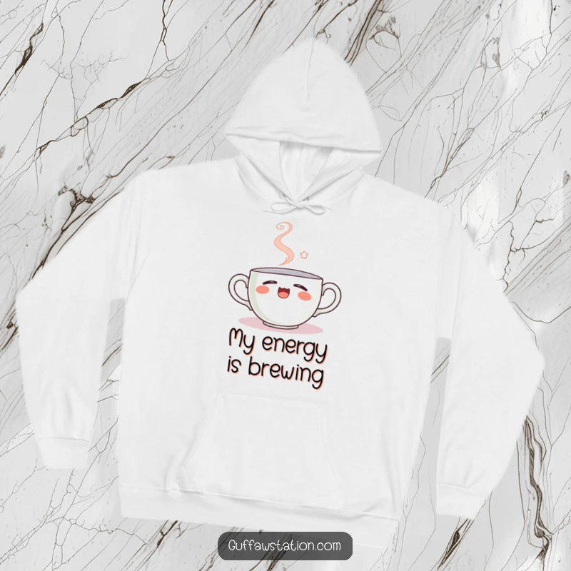 Funny hoodie featuring a sleepy teacup yawning, steam creating a smiley face, a warm and humorous garment for cozy moments.