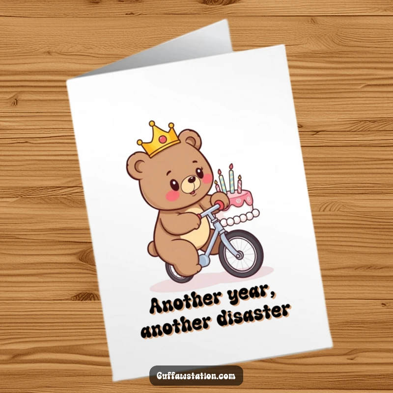 Funny Free Printable Birthday Card: A crowned bear comically fails unicycle stunt into a birthday cake.