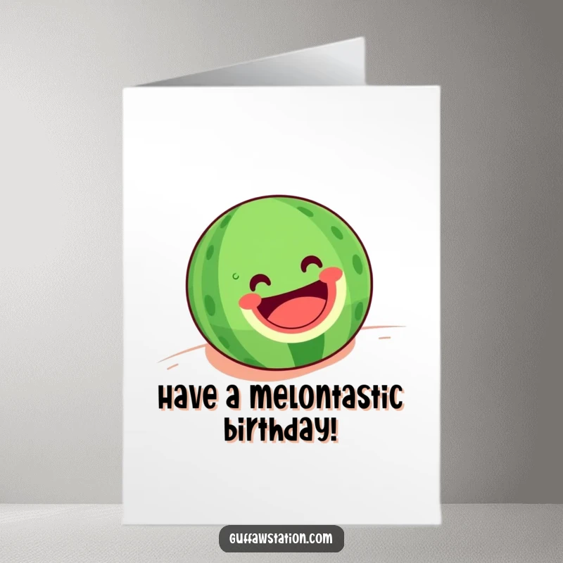 Funny Free Printable Birthday Card: A joyous watermelon with a wide grin, energetically rolling down a green hill, celebrating.