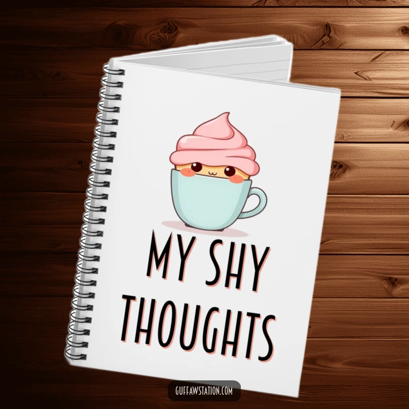 Funny blushing cupcake hiding behind a tiny coffee cup on the cover of a humorous and sweet notebook.