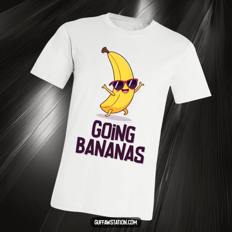 Funny happy banana wearing sunglasses, performing a cartwheel, featured on a humorous funny t-shirt.