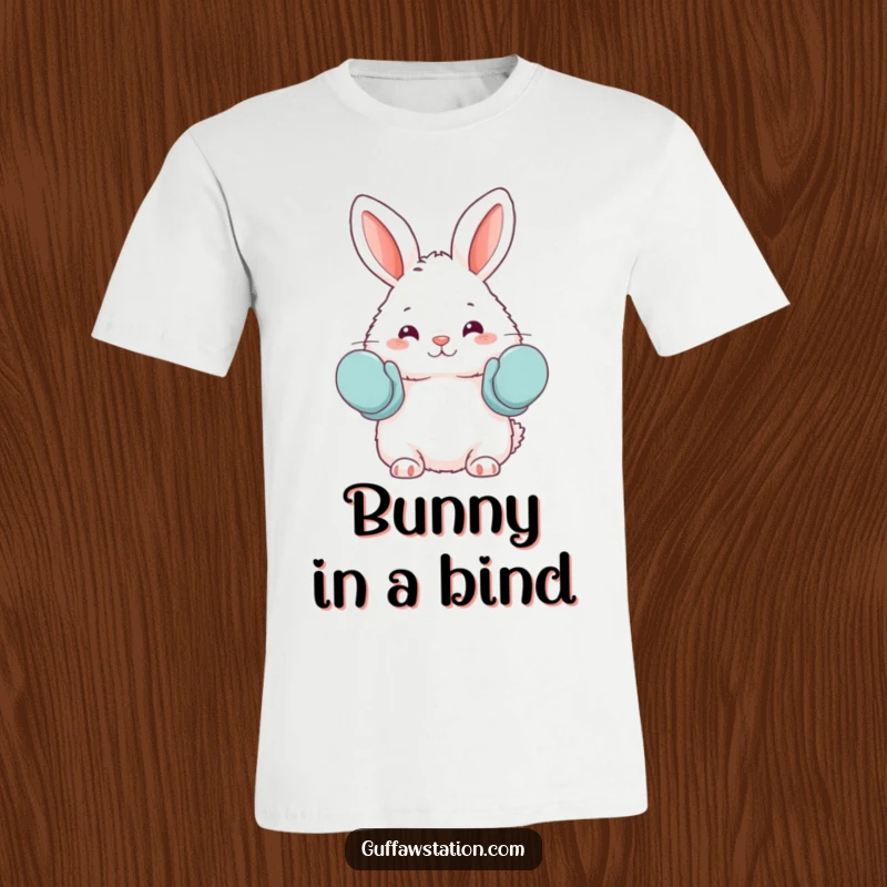 Funny t-shirt featuring a fluffy bunny accidentally wearing oven mitts as mittens, ideal for bakers and fans of cute, humorous designs.