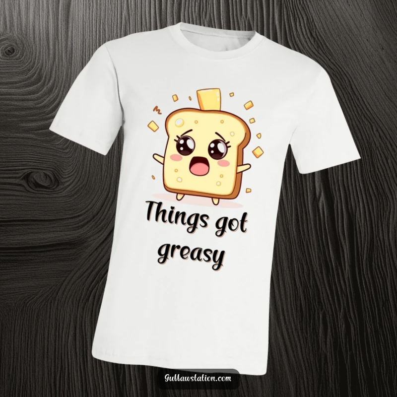 Funny surprised toast character with butter splattering everywhere, wide-eyed, on a soft cotton t-shirt.