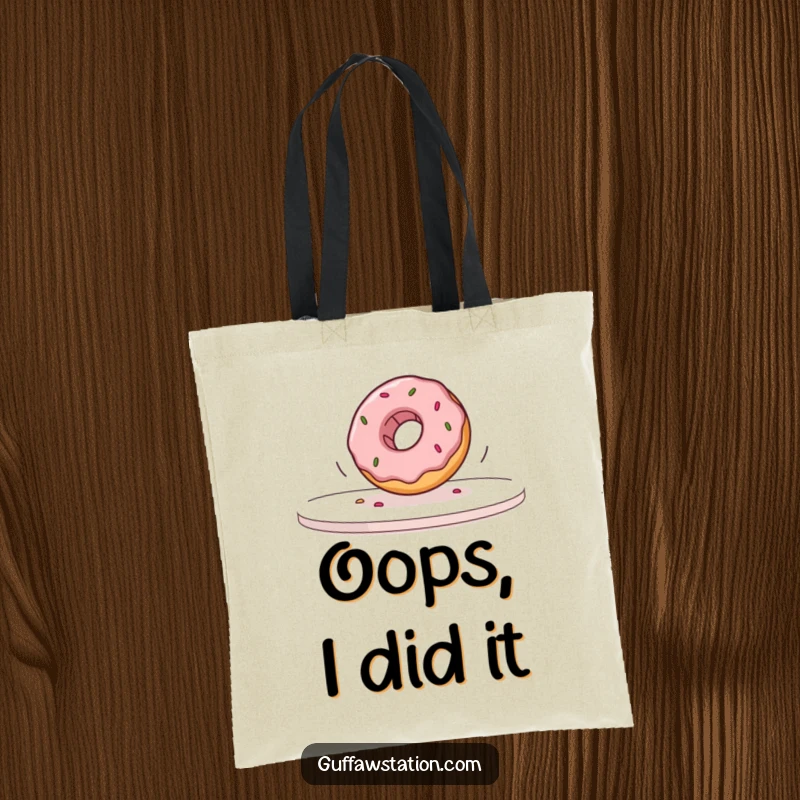 Funny donut captured mid-fall off a table in slow motion, featured on a practical tote bag for humorous carrying.